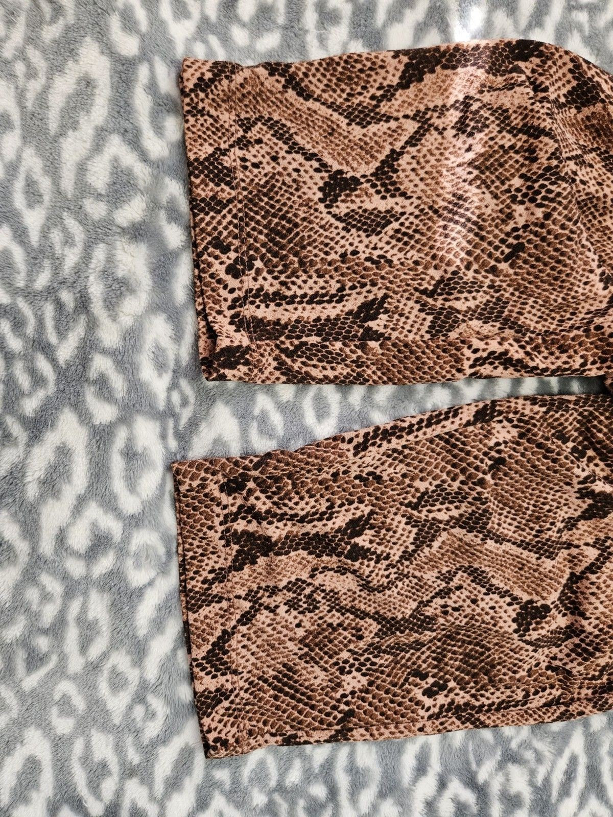 EXPRESS SNAKE PRINT JUMPSUIT SIZE SMALL