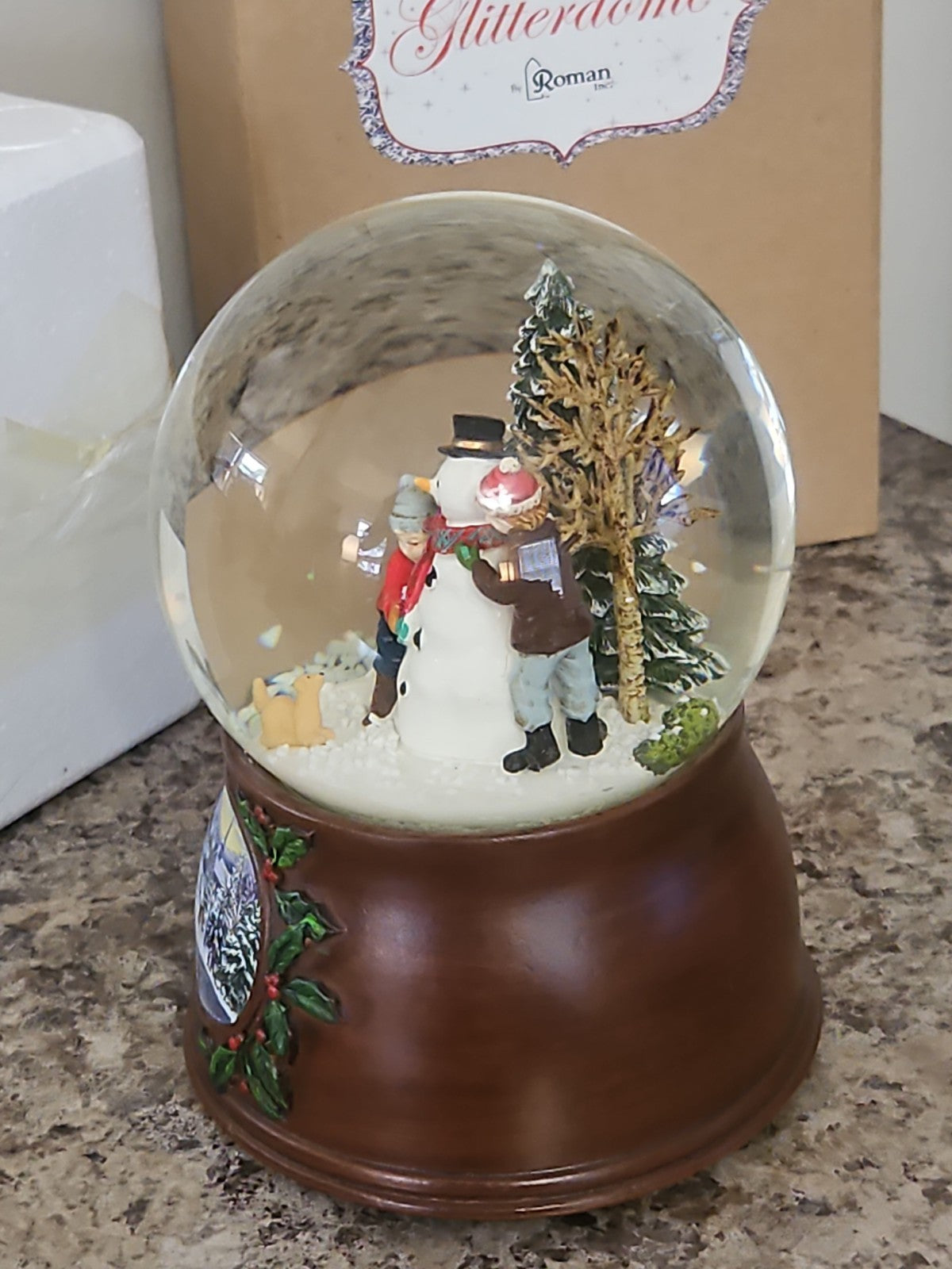 Musical Roman Snow Globe Snowman Scene  Plays We Wish You a Merry Christmas
