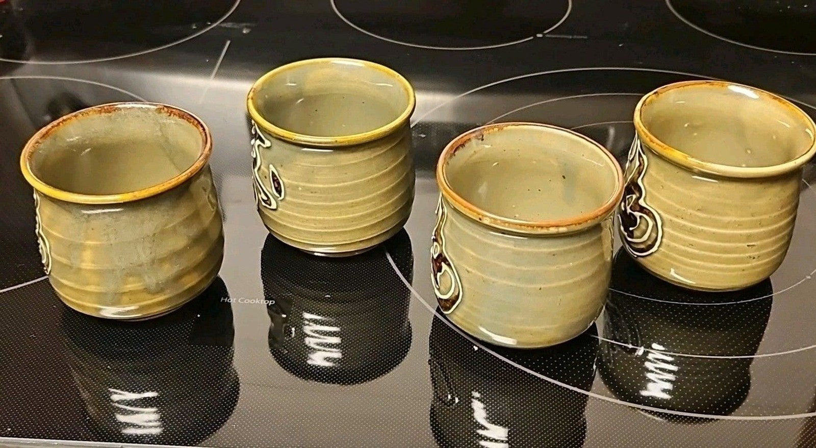 Set Of 4 Glazed Stoneware Japanese Lettered Sake or Tea Cups