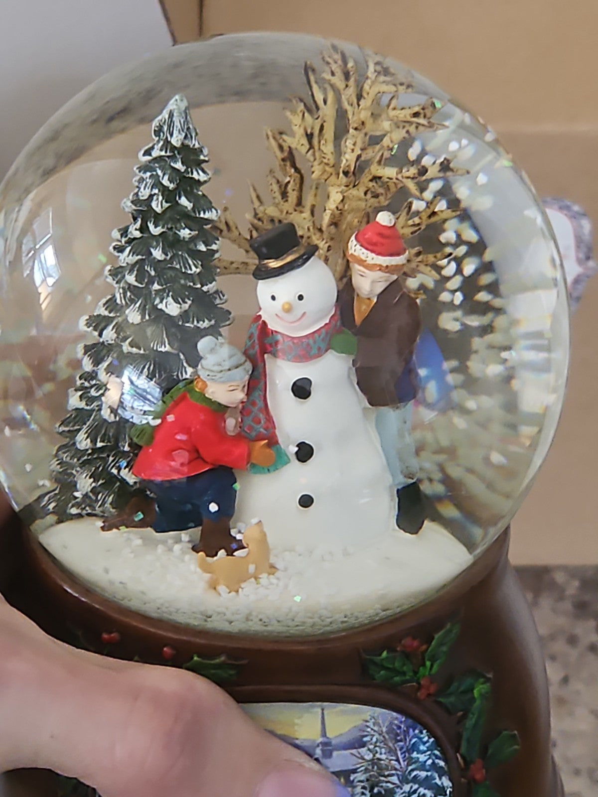 Musical Roman Snow Globe Snowman Scene  Plays We Wish You a Merry Christmas